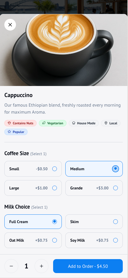 The QR ordering menu on a phone, open on a cappuccino with size and milk options and an add to order button.